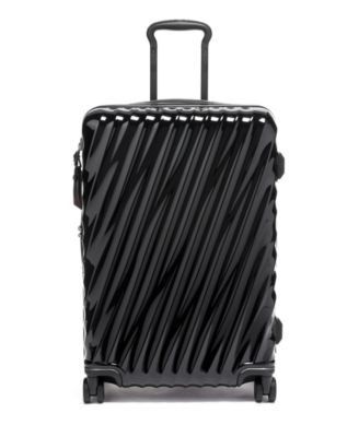 TUMI