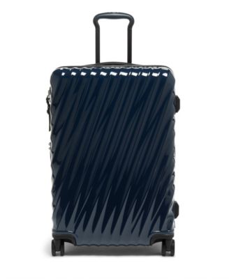 TUMI